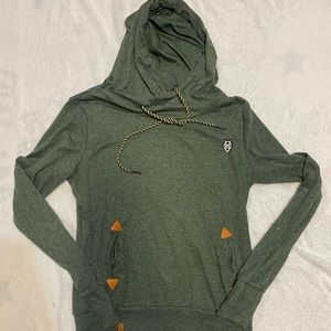 Woman’s green pullover